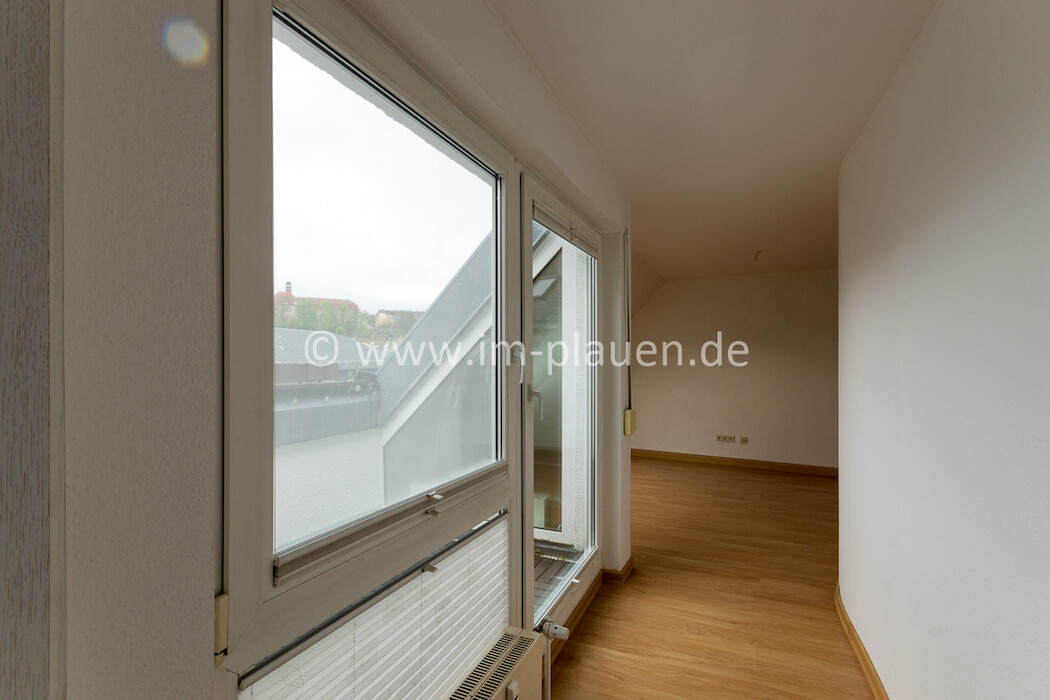 Wohnzimmer mit Balkon