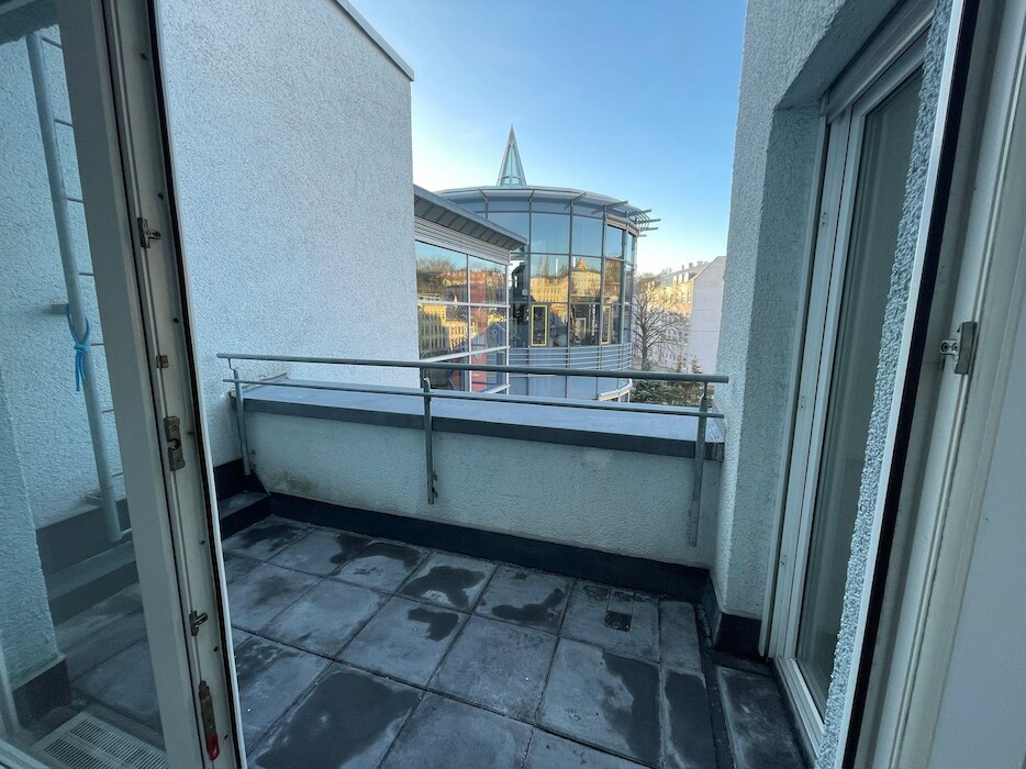 Balkon – Tiefgarage | 1-Zimmer-Wohnung Auerbach Zentrum - Foto 4